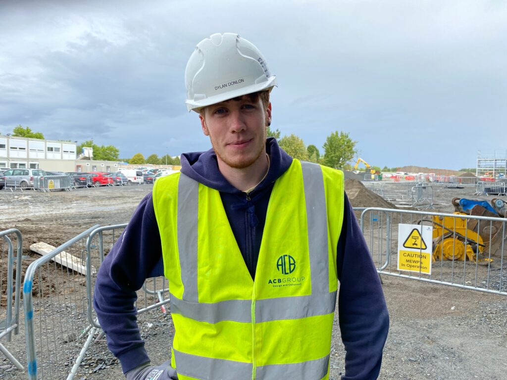 Dylan Donlon poses for a picture on site